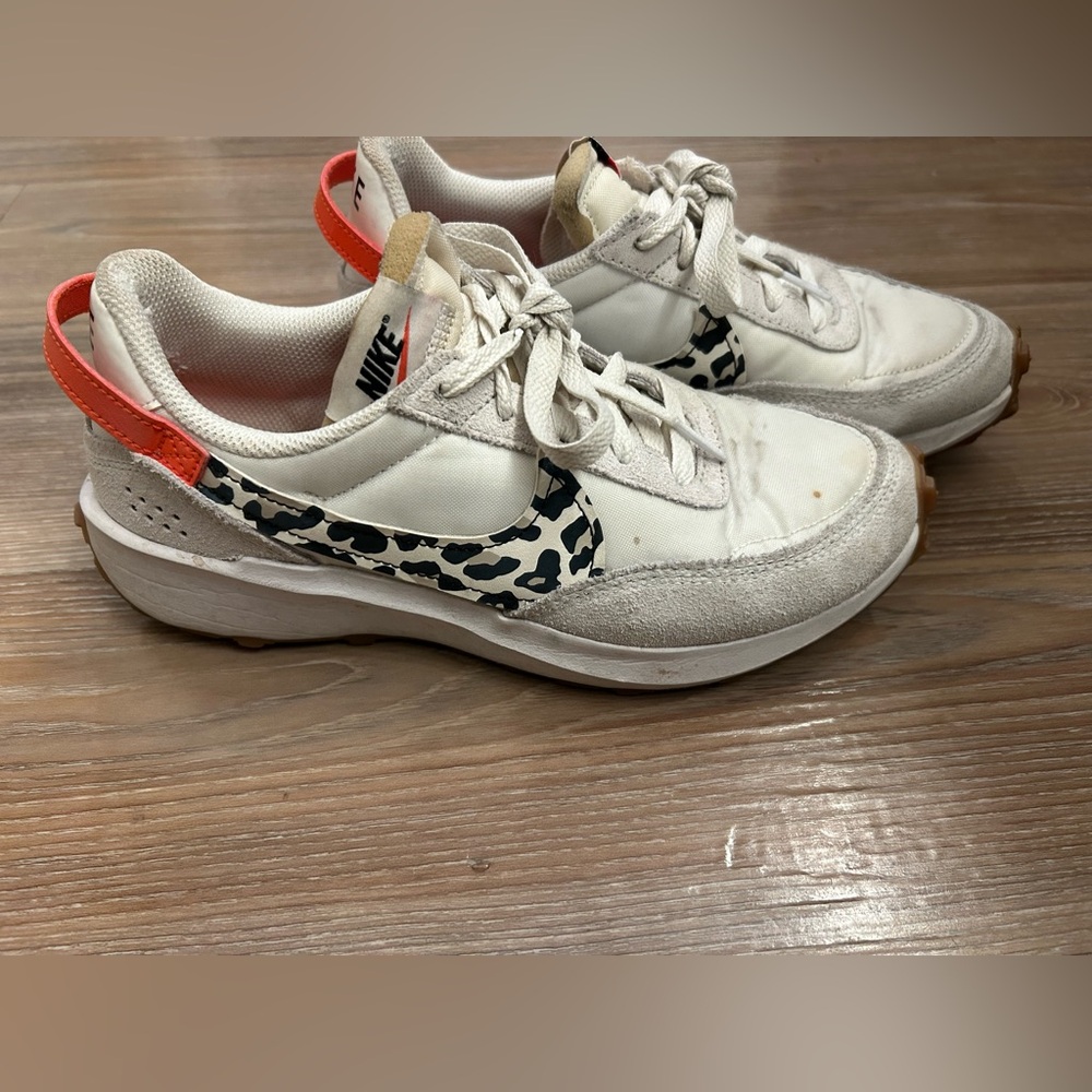 Nike ladiesWhite Sneakers with Gum Rubber Soles. Size 7